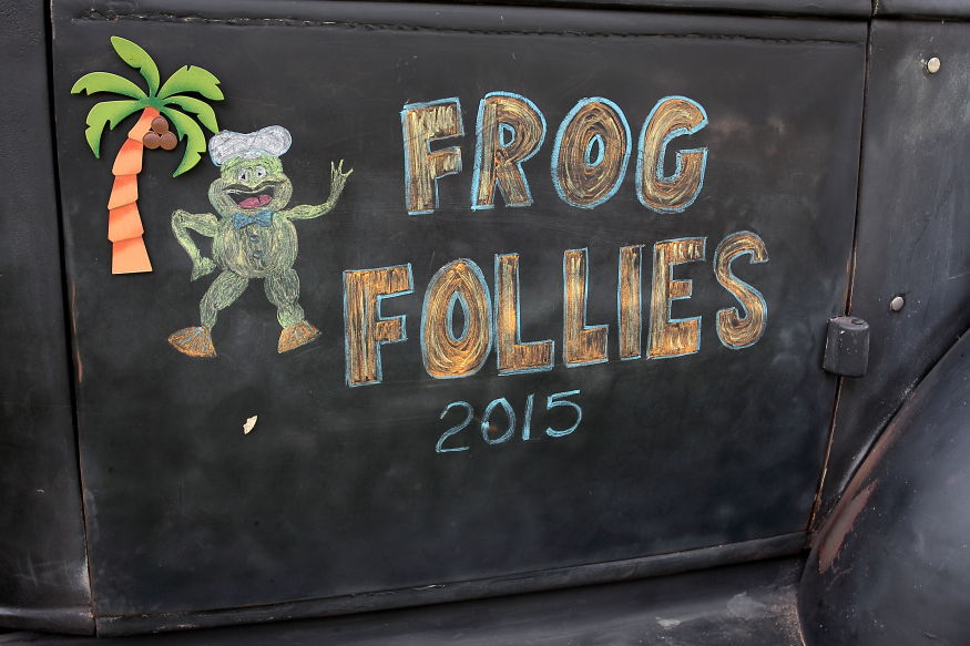 Drawing on vehicle door, says Frog Follies 2015