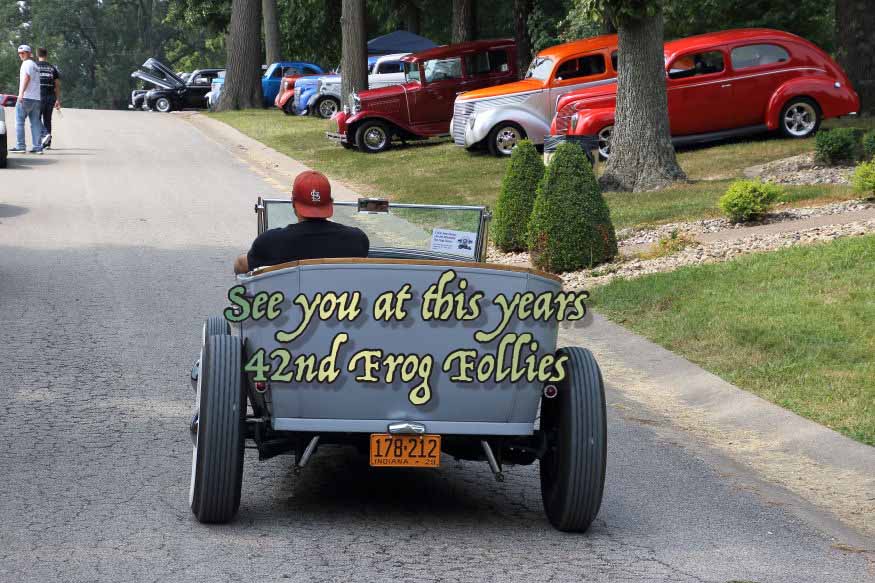 This gentleman is having fun cruising in his tub primered street rod