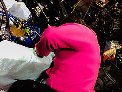 Samantha working on the engine